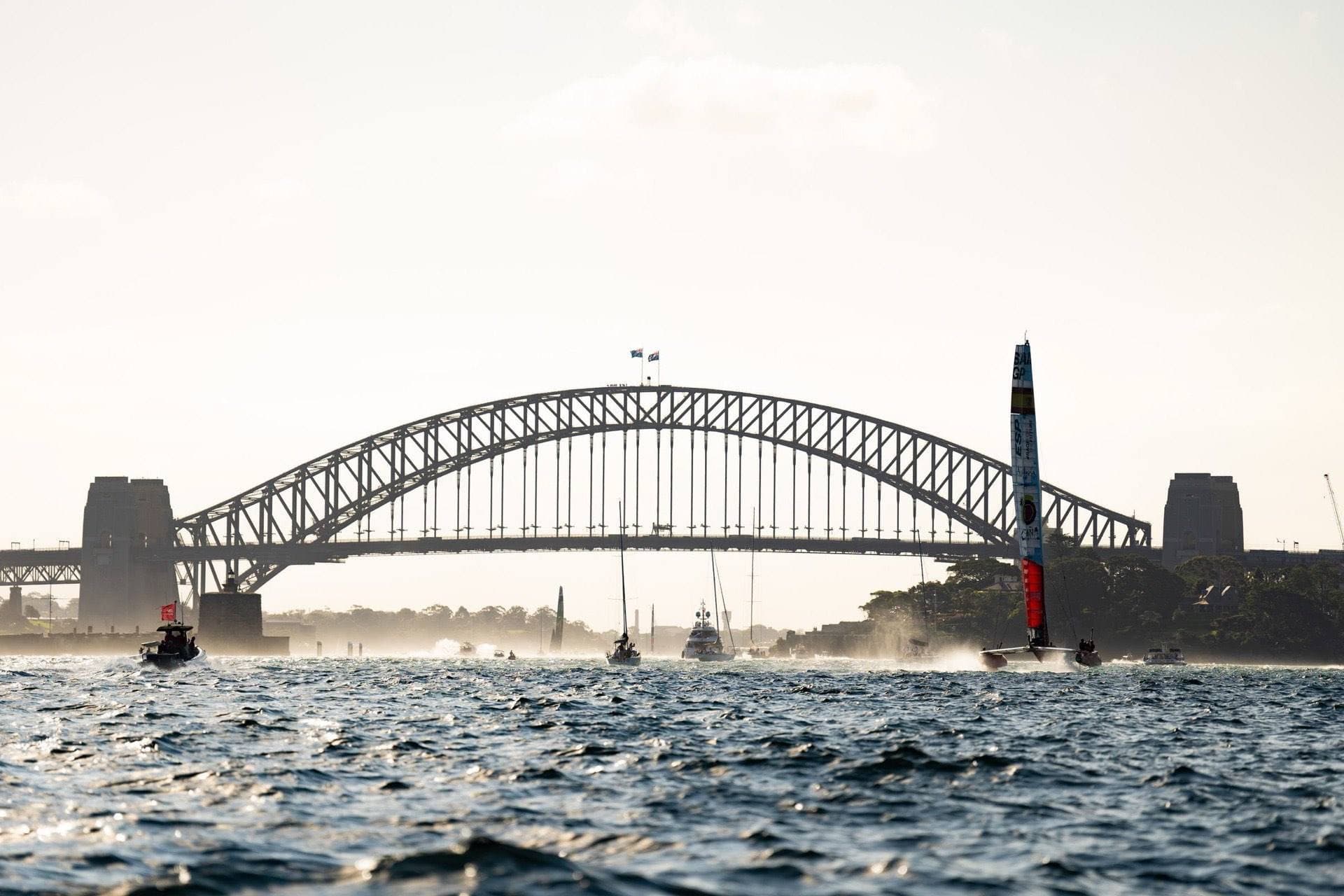 Racing sailboats competing on the sea